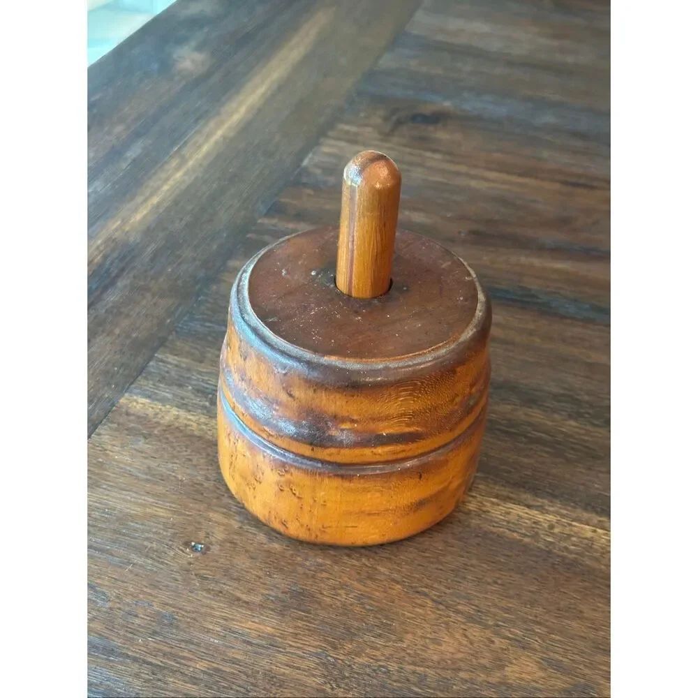 Antique wooden butter press